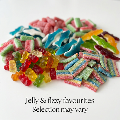 Illustrative close-up of Starter Mix jelly bears, sharks, crocodiles and fizzy belts; selection may vary.